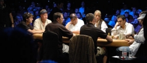 Players around poker table